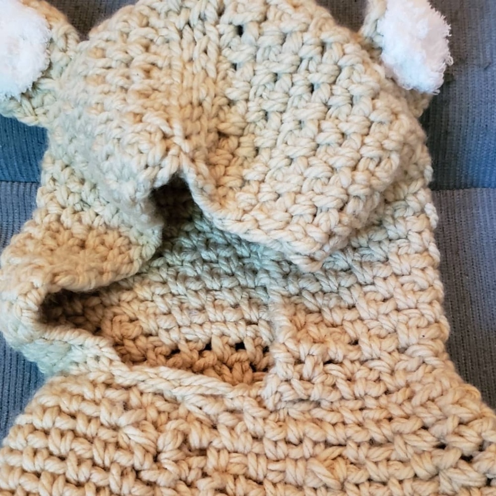Hand-crocheted bear poncho